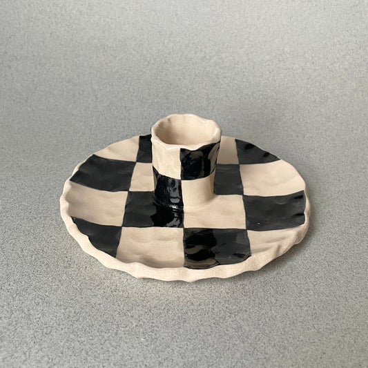 black checkered candle holder
